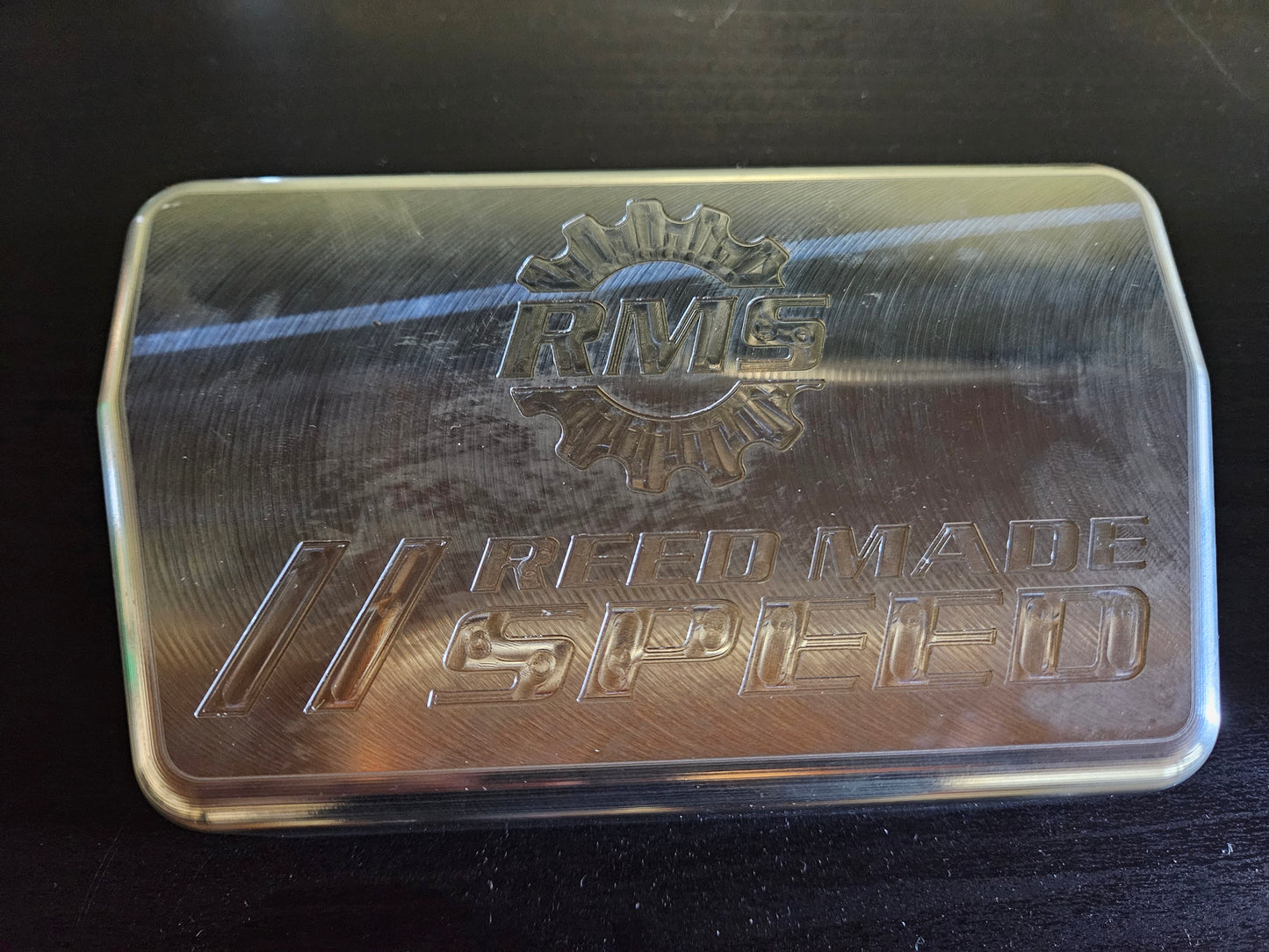 Billet machined rugged radio cover with reed made speed logo